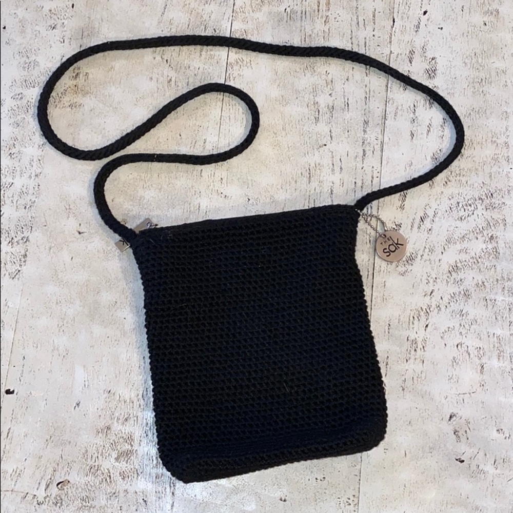 Black woven crossbody from The Sak